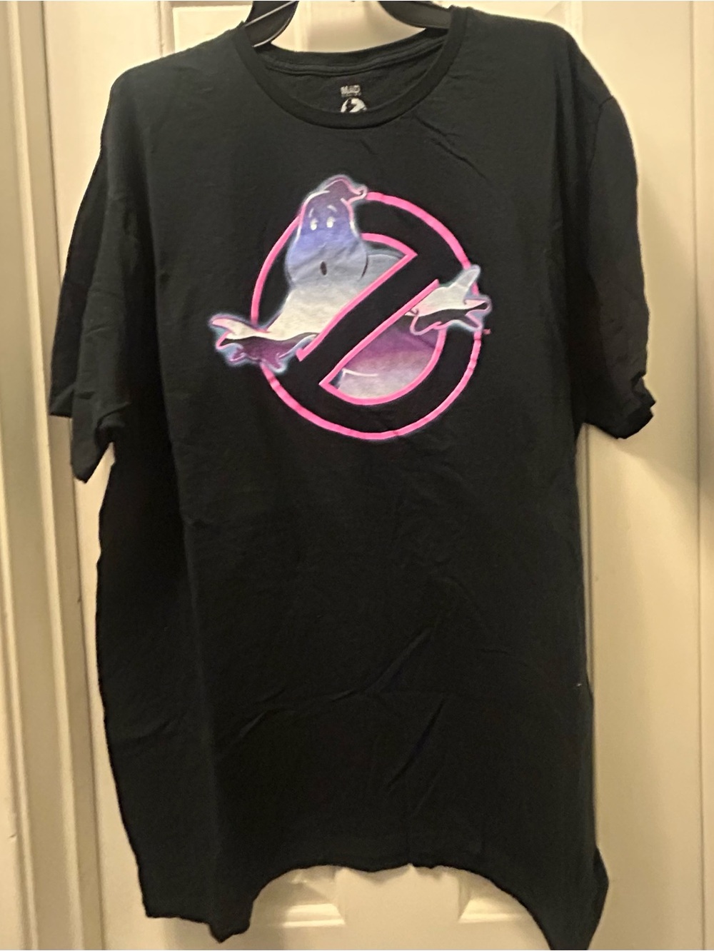 Retro Black Ghostbusters Logo Tee with Neon Pink Accent